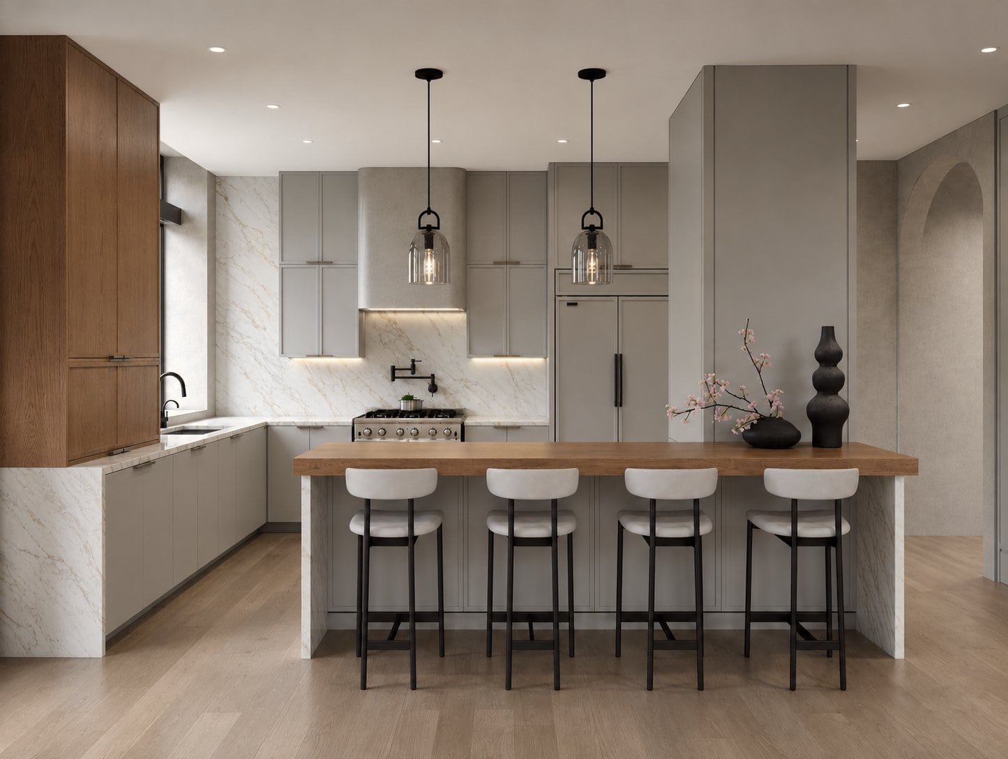Hoboken loft kitchen with marble backsplash, wood island counter, and glass pendant lights by KMG Interiors