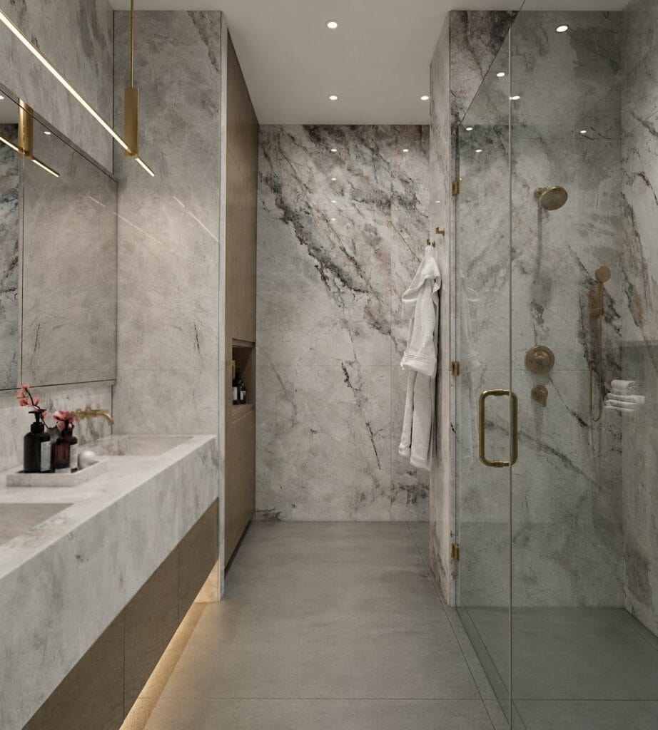 Marble master bathroom in a Garden Street Hoboken loft designed by KMG Interiors