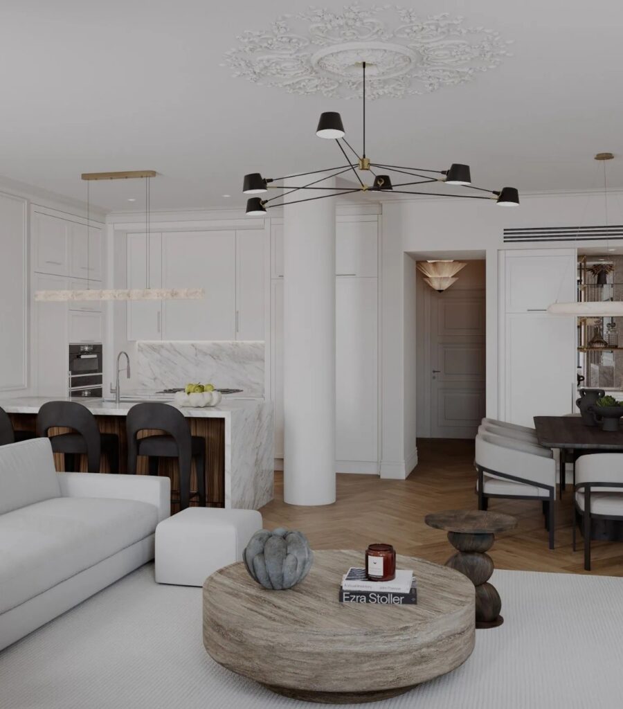 Kitchen island, dining nook and living room under a plaster ceiling medallion in an Upper West Side apartment.